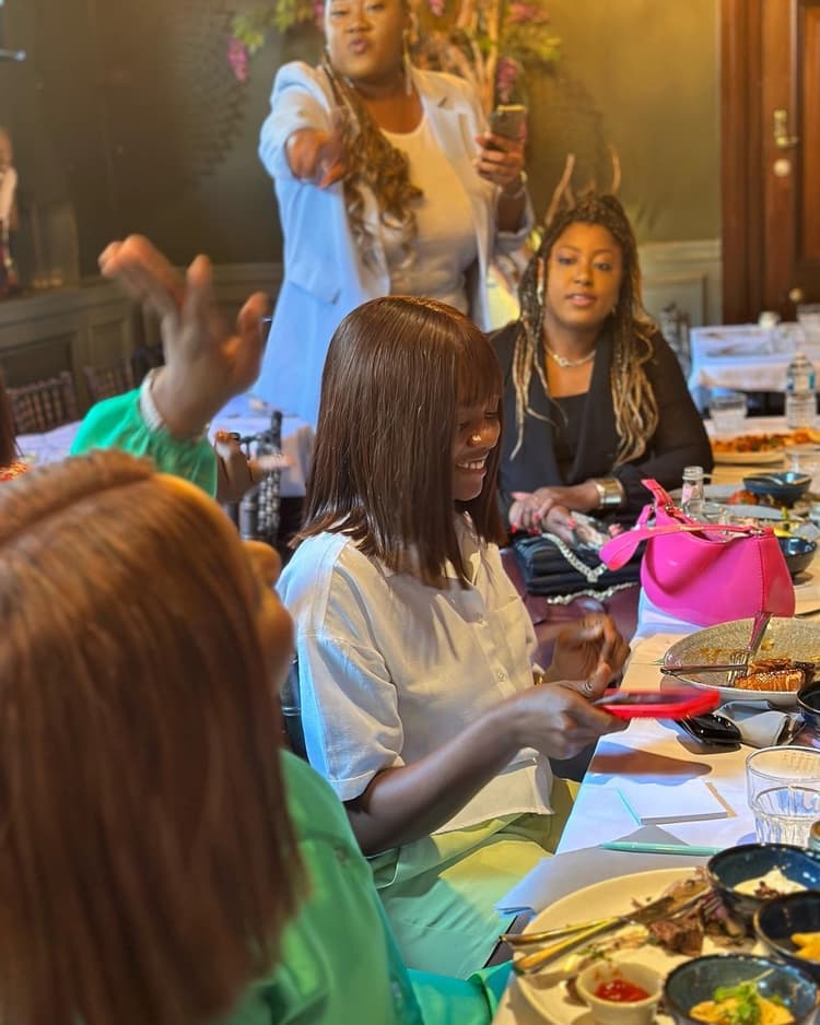 Members of the community around the table at a Bloom & Become gathering